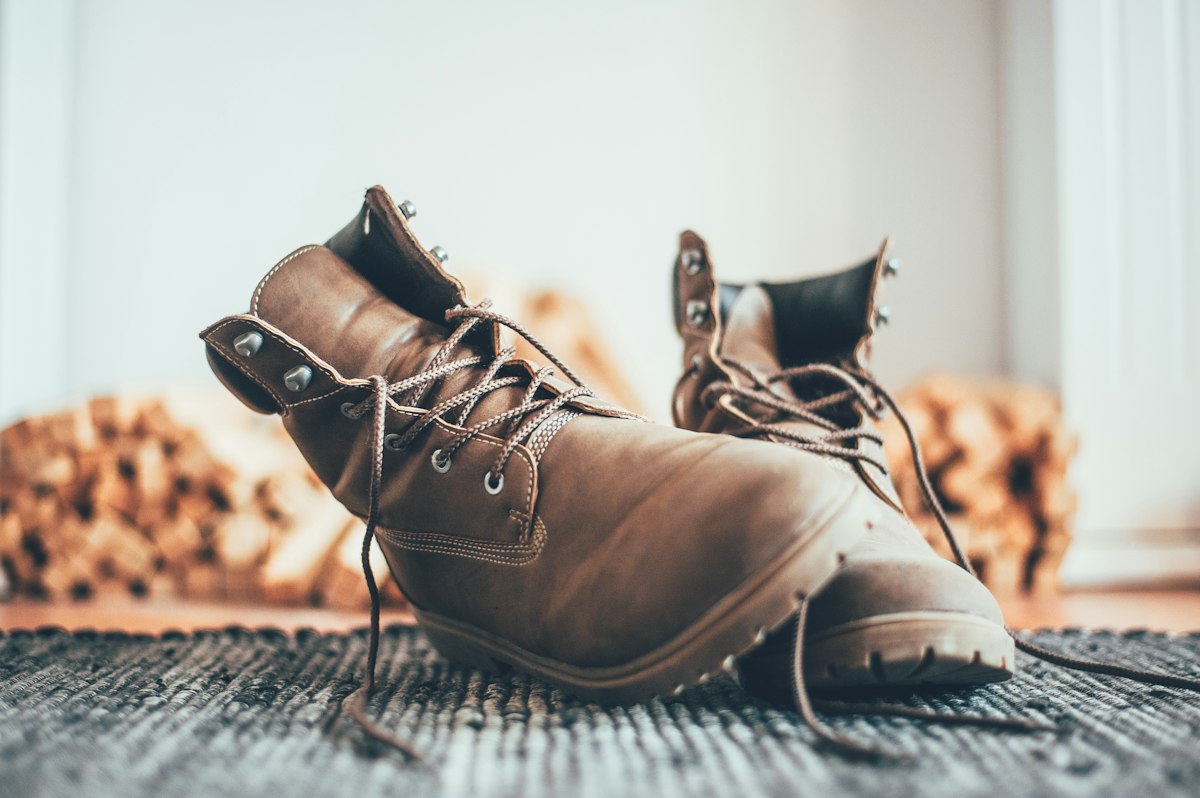 A pair of brown leather lace-up boots